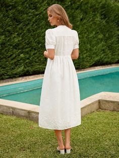 Experience the blend of elegance and comfort with the Isabella Women's Floral Embroidery Puff Sleeve Dress. Presented in a classic white color, this A-line dress boasts details like contrast lace and buttons, exuding an air of sophistication. Its round neckline complements the short puff sleeves, creating a beautiful harmony. The dress's high waist falls into a long, flared hem, enhancing the overall silhouette. With its loose fit designed to provide ease, this dress is made from non-stretch woven fabric, adding an element of surprising softness. This Isabella's creation is the perfect piece for your elegant look. SIZE + FIT Model is Wearing: S (UK8) Height: 174.0 / 68.5 Bust: 90.0 / 35.4 Waist: 70.0 / 27.6 Hips: 100.0 / 39.4 DETAILS + CARE Color: White Style: Elegant Details: Contrast Lac فستان زهري, Floral Wedding Dress, Puff Sleeve Dress, Puffed Sleeves Dress, Style Elegant, White Style, Classic White, Floral Embroidery, Puff Sleeves