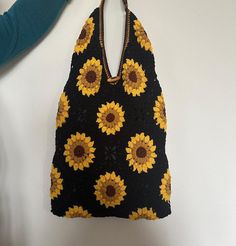 Title: SUNFLOWER Crochet Totebag, Black Floral Cotton, Black Shoulder Bag, Handmade, Stylish, Bohemian Beach Bag, Gift for Her, Express Shipping 🌻 Sunflower Tote (Black)🌻      We are so proud to present our cotton sunflower bag.😏 This totebag is large enough to hold your things you need to carry around in your everyday life. We loved its practical use and stylish appearance. This eye-catching bag will not leave you indifferent.😘😍 Product Details; - Carefully handcrafted with Cotton Yarn - E Sunflower Bag, Beach Bag Gift, Sunflower Crochet, Bohemian Beach, Black Shoulder Bag, Bag Handmade, Beach Bag, Cotton Yarn, Everyday Life