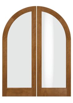 an oak double door with arched glass and wood trims on the top half of it