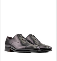 This Oxford Black Calf Leather Men's Shoe is a timeless classic for any wardrobe. Handcrafted in Spain, its Goodyear welted leather and rubber sole are designed to last. Our Swift7 Service, ensures your shoes will be ready in as little as seven days. Dress up or dress down and experience a timeless style. Details: Oxford closed lacing style, elegant, classic, timeless Swift7 Service, handmade in Spain in 7 days Cognac Goodyear Welted sole with mixed leather and rubber Sleek looking aesthetic wit Men's Shoe, Seven Days, Your Shoes, Goodyear Welt, Lace Fashion, Style Elegant, Dressed Down, Timeless Classic, Timeless Style