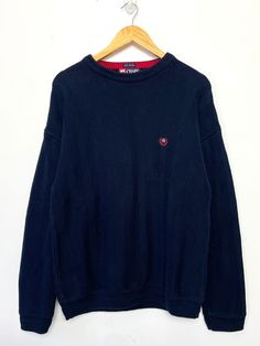 This sweater remains in pre owned condition.  Measurements  Pit to pit (width): 22 1/2 inches Top to bottom (length): 26 inches Blue Ralph Lauren Winter Sweater, Ralph Lauren Navy Sweater V Neck, Vintage Ralph Lauren Sweatshirt, Vintage Blue Crew Neck Sweater, 90s Blue Cotton Sweater, Chaps Ralph Lauren, Logo Knit, Pullover Outfit, Knit Pullover