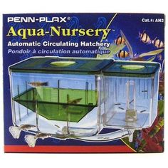 an aqua nursery with two fish in it's tank and the box is open