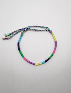 Pastel friendship bracelet, Wrapped bracelet, Pastel goth, Pastel grunge This colourful wrapped bracelet is made out of turquoise,navy,green,pink,purple and lemon cotton thread. It is ended with two braids in order to fit a lot of sizes. Custom orders for different color combinations are welcome. Width:0,4cm Other friendship bracelets in my shop: https://www.etsy.com/shop/LuckyRatJewellery?section_id=16489590&ref=shopsection_leftnav_7 *Colors may differ slightly from the original due to the conf Adjustable Hippie Style Friendship Wrap Bracelet, Resizable Hippie Friendship Bracelet, Resizable Hippie Friendship Bracelets, Adjustable Hippie Braided Friendship Bracelets, Adjustable Hippie Braided Bracelets For Friendship, Multicolor Resizable Wrap Bracelet For Friendship, Hippie Style Friendship Bracelets As Gifts, Hippie Style Resizable Friendship Bracelets As Gifts, Adjustable Multicolor Rave Wristband