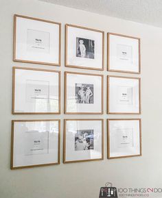 a bunch of pictures hanging on the wall with some white and gold frames above them