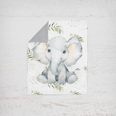 an elephant on a white background with green leaves