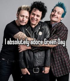 three men hugging each other with the caption i absolutely adore green day