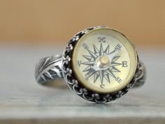 Handmade sterling silver ring with vintage style mini working compass sets in center. Ring hand made to order and is antiqued and lightly polished by hand. Made to order item, current processing time is 5 to 7 business days. Measurement, Compass measures about 14mm in length including bezel setting, made to order item so just choose your preferred size when checking out. Compass Ring, Compass Jewelry, Handmade Sterling Silver Rings, Ring Hand, Oxidized Sterling Silver, Engagement Jewelry, Dream Jewelry, Handmade Sterling Silver, Ring Handmade