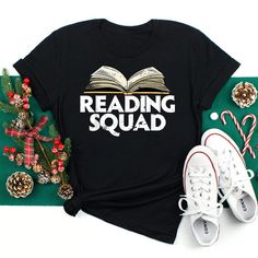 Buy Reading Squad Reading Lover Readers Shirt at Fantasywears. Hight quality products with perfect design is available in a spectrum of colors and sizes, and many different types of shirts! Unisex T-Shirt – 100% Cotton (fiber content may vary for different colors) – Medium fabric (5.3 oz/yd² (180 g/m²)) – Classic fit – Tear away the label – Runs true to size Women T-Shirt – 100% combed ringspun cotton (fiber content may vary for different colors) – Light fabric (4.3 oz/yd² (146 g/m²)) – Slim fit Librarian Tshirts, Library Shirt, Librarian Shirt, School Librarian, Gifts For Librarians, Squad Shirt, Hoodie Fits, Cotton Tank Top, Sleeve Detail