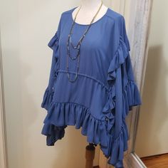 Gorgeous Blouse By Olympiah, The High-End Luxury Designer Mother-Daughter Duo From Sao Paulo, Brazil. Formed Out Of The Love Of Putting Needle To Thread, For Women Who Love Passion And Originality In Their Clothes. Size 40 Is Equal To A 6, But Would Fit A Size 8 Better. Retail Approx $254 New With Tags! Slate Blue Color (Like Actual Photos) Ruffled Sleeves Cascade Down The Sides Of The Blouse. Round Neckline, Ruched Waist, Side Ties. Measures 38" Bust, Length From Shoulder Is About 28" Blue Ruffle Sleeve Tops For Fall, Casual Blue Blouse With Butterfly Sleeves, Blue Bohemian Blouse With Ruffle Sleeves, Bohemian Blue Blouse With Ruffle Sleeves, Bohemian Ruffle Sleeve Blouse, Blue Ruffled Blouse For Summer, Blue Ruffles Blouse For Summer, Summer Blue Ruffled Blouse, Flowy Ruffle Sleeve Blouse With Ruffles