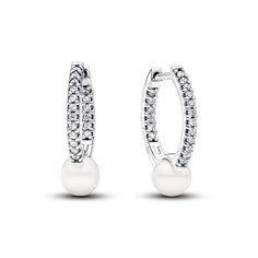 Keep it classy with our Treated Freshwater Cultured Pearl Hoop Earrings. Crafted in sterling silver, the slightly squared hoops showcase a delicate concaved section featuring a treated freshwater cultured pearl. The click closure ensures a secure fit. This pair, an everyday addition to the Pandora Timeless collection, celebrates the timeless allure of pearls and the artful interplay of materials. Please note each treated freshwater cultured pearl is unique and can vary in size and colour; normal wear and tear may occur with this material. Our freshwater cultured pearls are treated with bleaching and lustre enhancement. Pandora Pearl, Charms Pandora, Bracelet Pandora, Everyday Gifts, Pearl Hoop Earrings, Freshwater Cultured Pearls, Sterling Silver Earrings Studs, Pandora Jewelry, Cultured Pearls