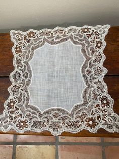 "This hanky/doily is a lovely piece of hand made lace made in the 1800s. A beautiful bridal gift and keepsake. 11.5 \" linen Wedding Handkerchief" Vintage White Wedding Lace, Vintage Cream Lace For Ceremonies, Lace Wedding Handkerchiefs With Lace Work, Wedding Handkerchiefs With Lace Work, Lace Handkerchiefs With Lace Trim For Wedding, Vintage Cream Lace For Ceremony, Wedding Lace Handkerchief With Lace Work, Victorian White Lace For Vintage Events, White Victorian Lace For Vintage Events