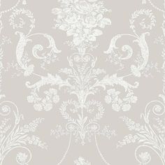 a beige and white wallpaper with an ornate design on the bottom half of it