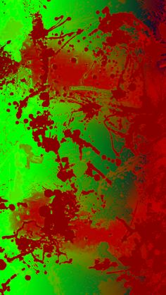 an abstract background with red and green paint splattered on the bottom right corner