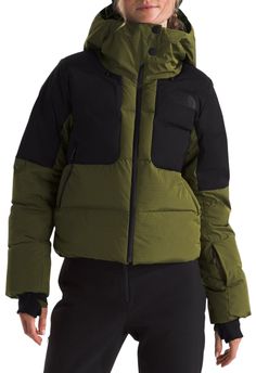 Intense winter weather meets its match in this jacket. The helmet-compatible hood provides full coverage against the elements, the amount of included pockets spoils you for choice in storage, and customizable zips, gaiters, and vents help you regulate your temperature. Fit & Design Standard fit jacket Attached, adjustable, helmet-compatible hood with a snap closure, riveted cord-lock adjustment system, quilted interior and high-shine lining Brushed-tricot inner collar #5 YKK® AquaGuard® center front zip with a tab closure and rubberized snaps Get the most out of your jacket storage with zip hand pockets, covered, secure-zip wrist pocket with a goggle wipe, internal secure-zip chest pocket with a media port, and large, internal mesh drop-in pocket Underarm venting for temperature regulation Northface Puffer Coat, Jacket Storage, North Face Ski Jacket, Northface Puffer, Womens Athletic Outfits, Ripstop Fabric, Winter Weather, Athletic Outfits, Workout Jacket