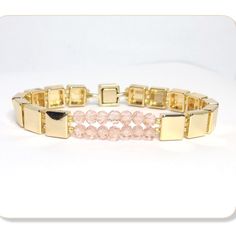 Women's Pink Tiled Crystal Bracelet New *Pink Crystals 4mm *Gold Cubed Tiles *Cube Gold Magnetic Clasp * 7.5 Inches ** This Bracelet Can Also Be Made With Your Birthstone, Just Message Me Before Purchase** Pink Jubilee Bracelet For Party, Adjustable Pink Gold Bracelet For Party, Trendy Pink Jubilee Bracelets, Beaded Memory Wire Bracelets, Lovers Bracelet, Beaded Memory Wire, Memorial Bracelet, Beaded Cuff Bracelet, Handcrafted Bracelets