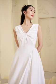 Elegant White Asymmetrical Dress, Elegant Sleeveless Maxi Dress With Folds, Elegant Asymmetrical Midi Dress With Folds, Feminine Fitted Asymmetrical Maxi Dress, Elegant White Draped Asymmetrical Dress, Elegant Ruched Maxi Dress With Asymmetrical Hem, Elegant Maxi Dress With Ruched Asymmetrical Hem, Chic Dresses With Asymmetrical Hem And Folds, Chic Fitted Maxi Dress With Folds