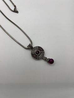 Vintage 1970's  Silver Plated, Amethyst and Marcasite Circular Pendant on a 30" Snake Chain Excellent vintage condition, old new stock,  never worn Please stop by our shop at https://vtgglamjewelry.etsy.com Don't forget to heart our shop to get updates in your news feed for our new arrivals! Retro Purple Jewelry For Gifts, Purple Cabochon Round Necklace, Purple Round Cabochon Necklace, Antique Round Purple Necklace, Vintage Purple Round Pendant Jewelry, Vintage Purple Round Jewelry, Vintage Amethyst Pendant Necklace, Vintage Round Purple Necklace, Vintage Purple Pendant Necklace