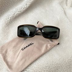 Authentic Silver Hardware Good Condition: Has Scratches On Lens Include: Dust Bag ~ *Modshot Provided* All Sales Are Final! Ig: Cloudsh.Luxury Please Feel Free To Msg Me If You Have Any Questions! Thank You. Chanel Glasses Case With Chain, Chic Rectangular Tortoiseshell Sunglasses, Logo Sunglasses, Sunglasses Logo, Chanel Accessories, Chanel Vintage, Vintage Quilts, Vintage Chanel, Silver Hardware