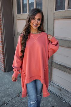 This Happy Pullover is an oversized, long-sleeve style in a vibrant rust hue! Put it on and leave; it is so easy to pair! A lower hem in the back plus the oversized design make it cute and comfortable! Liz is 5'3" and wearing a size small. Shell: 85% Cotton, 15% Polyester Contrast: 95% Cotton, 5% Spandex Oversized Fit, we recommend sizing down Oversized Orange Long Sleeve Top, Orange Relaxed Fit Long Sleeve Sweater, Orange Sweater With Relaxed Fit And Long Sleeves, Rust Long Sleeve Tops For Fall, Asymmetrical Sweatshirt, Fawn Design, Vintage Havana, Denim Shoes, Long Blonde Hair