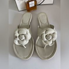 Interlocking Cc Logo Leather Slides Size 39 8 1/2 Preowned/Used Looks Great Please See Photos Purchase As Is Signs Of Treadwear Has Normal Wear Under 1 Inch Flats/Thong/Rubber Chanel Leather Slides, Chanel White, Leather Slides, Cc Logo, Chanel Shoes, Women's Shoes Sandals, 1 Inch, Looks Great, Shoes Sandals