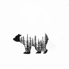 a black and white photo of two bears with trees in the backgrounge