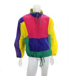 Vintage Ispo windbreaker jacket with a colorblocked design in yellow, green, hot pink, and purple (which appears a bit more bluish in the pics than it is).  100% nylon. Unlined. Machine washable.    This pullover jacket has a half length front zip, standing collar with drawstring ties, three front pockets, drawstring hem, and a hood which can be tucked into the back of the collar.  Overall good vintage condition but does have some small marks / spots as shown, most noticeably on the left sleeve. Colorblock Windbreaker, Standing Collar, Pullover Jacket, Windbreaker Jacket, Niagara Falls, Stand Collar, Color Blocking, Mens Jackets, Overalls