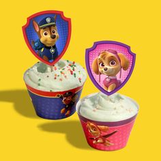 the paw patrol cupcakes are decorated with frosting and sprinkles