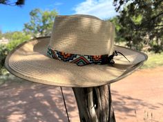 1" wide. This hat band is finished at 23" with glued down faux leather ends and an 24" adjustable leather tie. Bead Hat, Feed Bag Tote, Beaded Hat Bands, Feed Bags, Beaded Hat, Leather Tie, Beaded Cuff Bracelet, Beaded Cuff, Hat Band