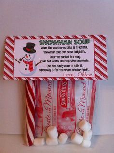 two candy bags with marshmallows in them and a snowman soap bar