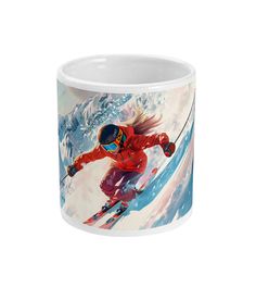 a white coffee mug with a skier on it's side and mountains in the background