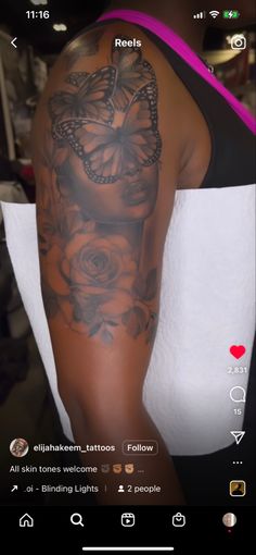 the back of a woman's arm with tattoos on it and roses in the background