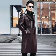 Looking to elevate your winter comfort and style? Your search ends here with this essential trench coat. Meticulously crafted from premium-grade cow leather, this long coat is your go-to option for casual occasions. Its double-layer collar and loose fit not only provide warmth but also exude a fashionable charm. The attractive button embellishments effortlessly create a chic and laid-back style. Leather Long Coat For Fall, Leather Winter Business Outerwear, Leather Business Outerwear For Winter, Leather Pea Coat For Business In Fall, Winter Business Leather Outerwear, Fall Leather Pea Coat For Business, Leather Business Outerwear For Fall, Leather Pea Coat For Business In Winter, Leather Long Pea Coat For Fall