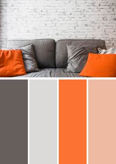 an orange and grey color scheme with brick wall in the background, along with pillows