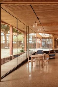 floor to ceiling glass systems and timber cladding to Lea Bridge Library Timber Panelling, Curved Glass, Sliding Glass Door, Glass Door, Ceiling, Flooring, Glass, Design