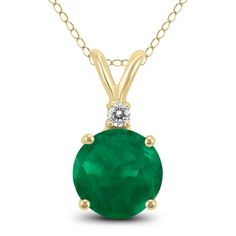 A beautiful 5mm round shaped emerald and diamond pendant necklace set in a 14K yellow gold basket setting. A single diamond weighs 0.02 carat. The pendant hangs from an 18 inch chain also crafted in 14K yellow gold. Classic Emerald Necklace With Diamond Accents, Classic Round Emerald Necklace With Diamond Accents, May Birthstone Necklaces With Diamond Accents, Round Emerald Necklace With Diamond Accents For Anniversary, Anniversary Emerald Necklace With Diamond Accents, Green Round Pendant Jewelry With Diamond Accents, Emerald Necklace With Prong Setting, Round Emerald Necklace With Diamond Accents As Gift, Emerald Necklace With Diamond Accents As Gift