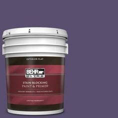 the behr ultra paint and primer in one is shown on a blue background