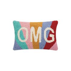 a colorful pillow with the word omg on it