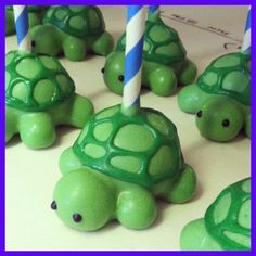 an image of turtle cakes with candles in them on instagram for turtles cake pops