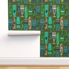 an egyptian wallpaper with green and blue masks