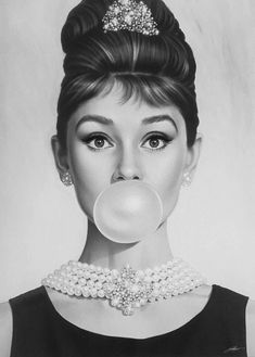 a black and white photo of a woman with bubble gum in her mouth, wearing a necklace