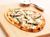 a pizza sitting on top of a wooden cutting board