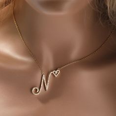 Initial Cursive Letters with Heart Pendant Necklaces Collier Upgrade your jewelry collection with our Initial Cursive Letters with Heart Pendant Necklaces. Crafted with attention to detail, this necklace is a stylish and meaningful accessory that adds a personalized touch to your look. Metals Type: Copper Necklace Type: Pendant Necklaces Material: Cubic Zirconia Shape/pattern: Letter Pendant Size: 2.3cm*2.2cm Chain Type: Link Chain Item Type: Necklaces Available Colors: Silver, Gold, Rose Gold E Rose Gold Initial Necklace, Heart Pendant Necklace Gold, Rose Gold Initial, Backdrops Necklace, Custom Initial Necklace, Cursive Letters, Initial Necklace Gold, Personalized Pendant, Custom Name Necklace