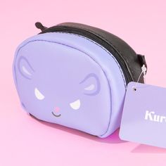 This kawaii pouch has a double-sided design featuring the faces of Kuromi and her sidekick, Baku! It comes with a convenient zipper closure and pop-out ears. Keep your mints and loose change inside! Made from synthetic leather Kawaii Bags With Card Slots For Everyday Use, Kawaii Coin Purse With Zipper, Kawaii Daily Use Coin Purse, Kawaii Pouch With Zipper Closure For Everyday Use, Kawaii Coin Purse With Zipper For Daily Use, Kawaii Portable Pouch For Everyday Use, Portable Kawaii Pouch For Everyday Use, Loose Change, Kawaii Shop