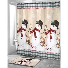 a shower curtain with three snowmen on it