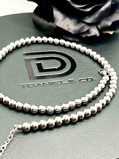 Let's Make a Statement! Our 6mm Stainless Steel Beaded Necklace are Handmade necklaces. They are the perfect accessory for any occasion. They are long lasting, Tarnish Free and Waterproof! 🖤 Each necklace is made to order with 6mm High Quality Stainless Steel beads with an 2 inch Stainless Steel extension chain. 🖤These necklaces are perfect for layering and can be paired with other necklaces. 🖤 All necklaces are sold separately.  RETURNS & REFUNDS POLICY We now offer exchanges & returns. If for any reason you order the wrong size or style item, you may exchange/return your item with 7 days of delivery. Please keep in mind the following conditions: * Buyer is responsible for return shipping costs * Exchange/return will only be excepted if item is in original condition. No Exceptions. * I Silver Single Strand Everyday Beaded Necklace, Dainty Silver Round Beaded Necklaces, Minimalist Silver Necklaces With Polished Beads, Minimalist Silver Necklace With Round Beads, Silver Minimalist Necklace With Polished Beads, Minimalist Silver Necklace With Polished Beads, Everyday Silver Necklace With Polished Beads, Silver Necklace With 8mm Beads And Adjustable Fit, Hypoallergenic Silver Necklace With Round Beads