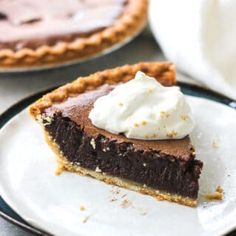 a slice of chocolate pie with whipped cream on top