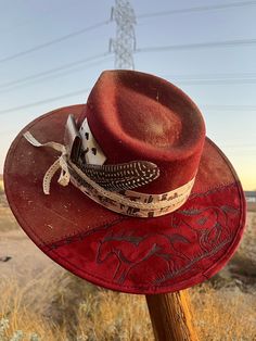 Southwestern Wide Brim Felt Hat For Western-themed Events, Red Western Fedora For Kentucky Derby, Custom Brimmed Fedora For Ranch, Custom Flat Brim Felt Hat For Western-themed Events, Rustic Festival Hat Bands For Short Brim Hats, Southwestern Felt Hat With Short Brim For Ranch, Flat Crown Fedora For Kentucky Derby And Western Events, Red Western Fedora With Short Brim, Western Style Red Fedora With Short Brim