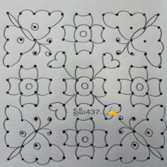 the pattern is made up of hearts and dots on white paper with yellow star in center