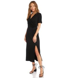 Elegant and alluring, this evening-ready midi dress is cut from fluid jersey-knit fabric and detailed with graceful draping. It's finished with a stylish side-slit. Black Dress Style, Petite Midi Dress, Spring Wedding Guest Dress, Jersey Wrap Dress, Los Angeles Usa, Surplice Neckline, Maxi Styles, Wrap Midi Dress