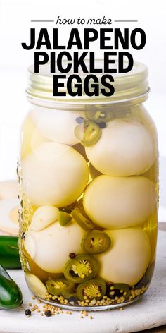 jalapeno pickled eggs in a glass jar